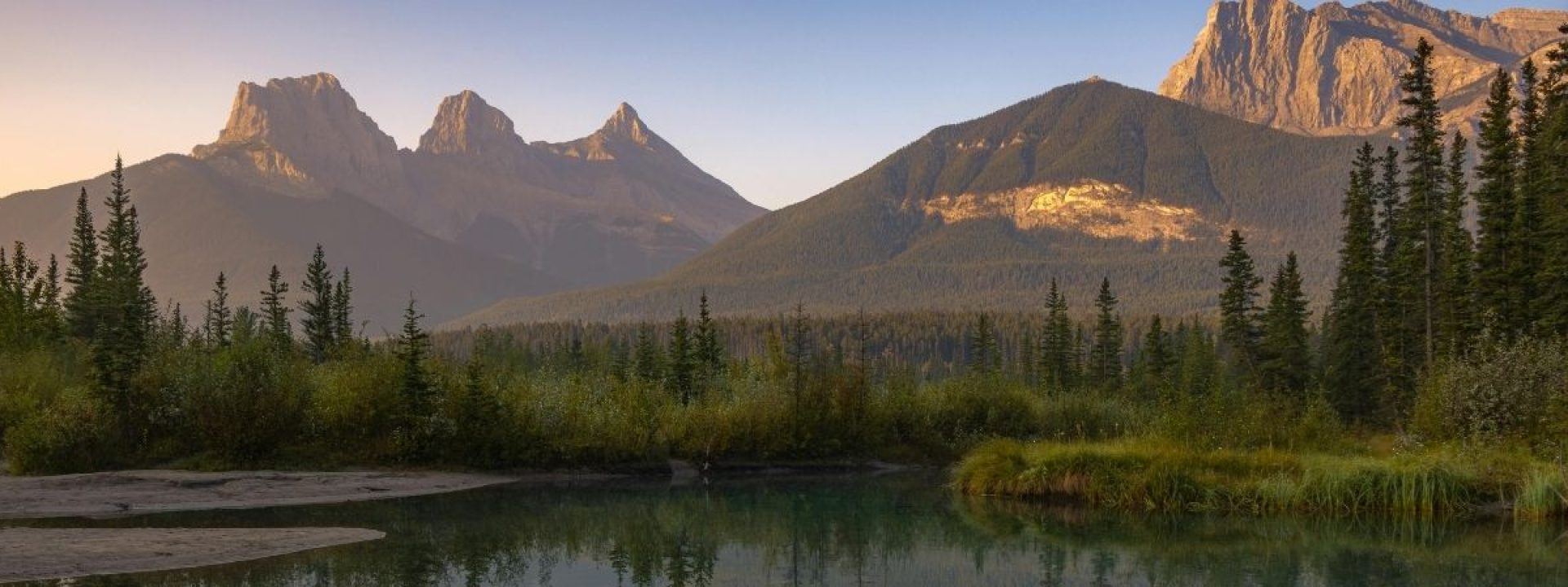 Serene Sunrise at Three Sisters in Alberta, Canada