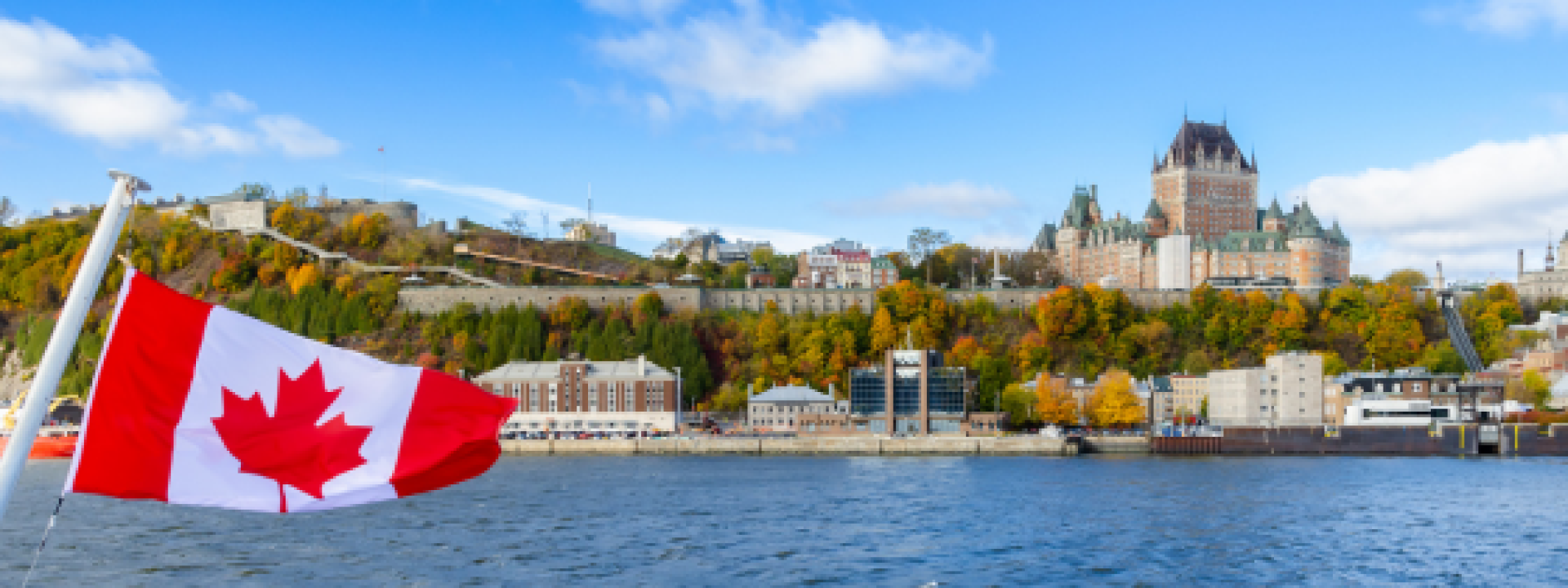 old city of quebec city with canada flag